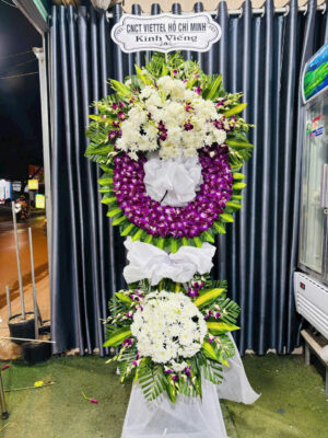 Floral arrangement with purple and white