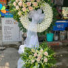 Floral wreath with white roses and greenery